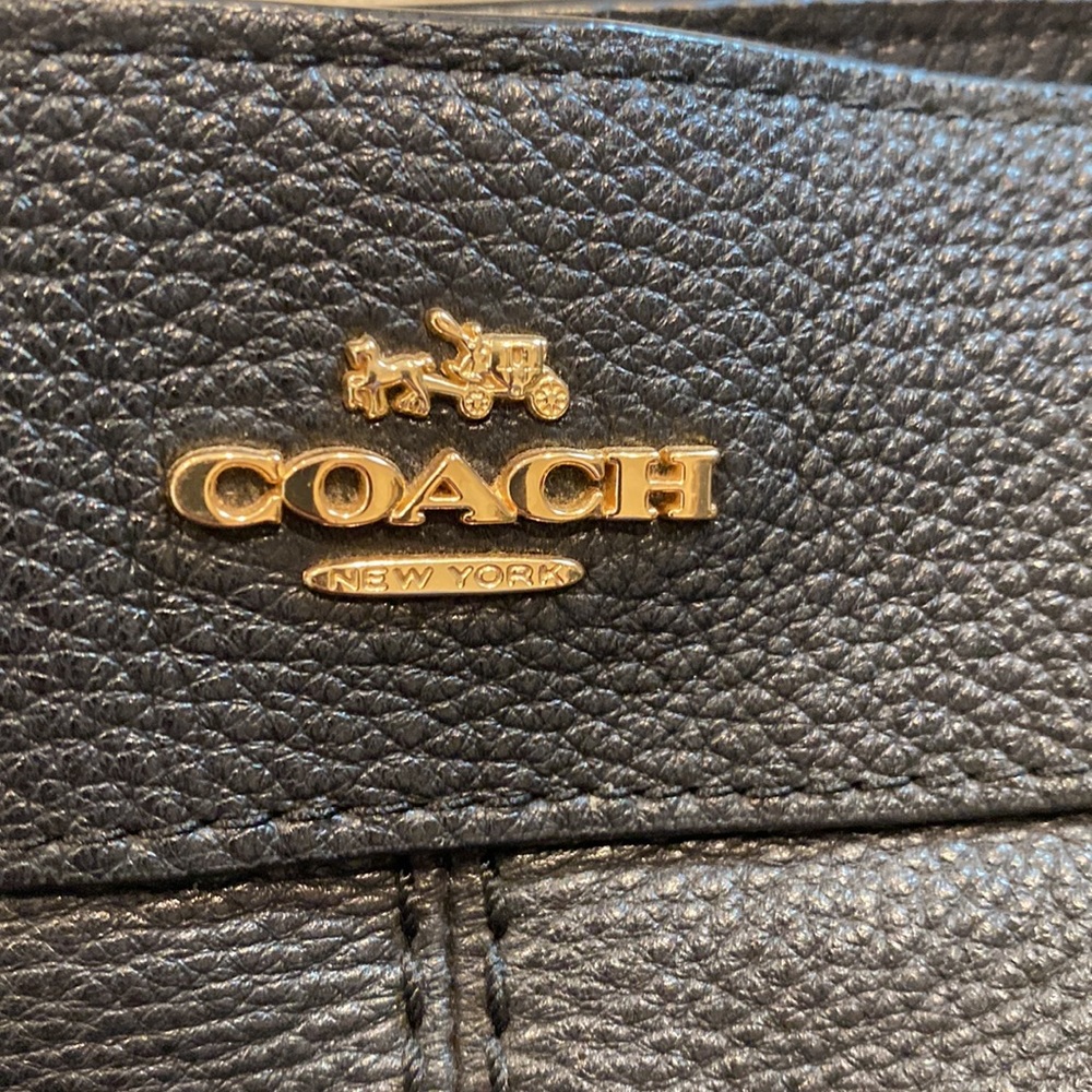 6Y Coach bucket bag. Perfect condition besides the handle straps. Original owner